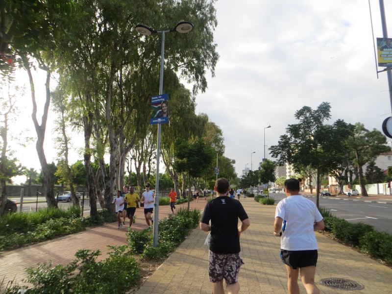 Runners participati gin the timed 5km Green Point parkrun